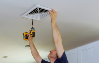 person removing duct cover